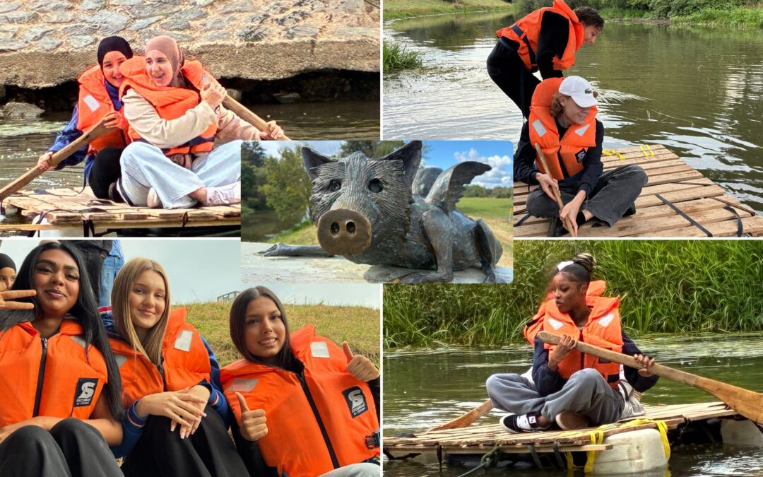 Schülerinnen und Schüler überqueren die Nidda