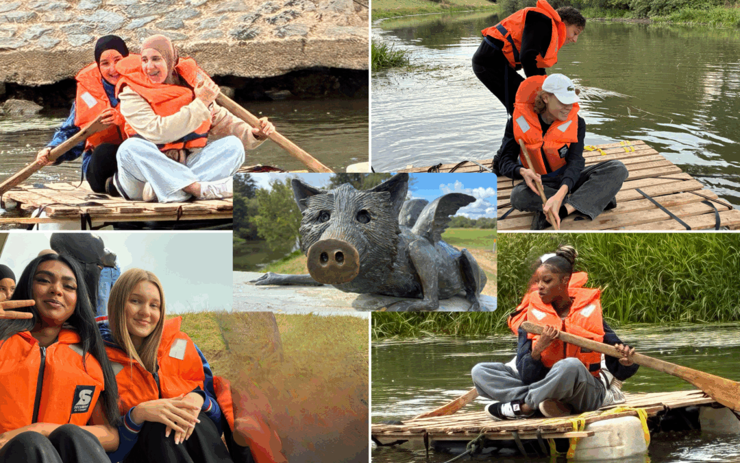 Schülerinnen und Schüler überqueren die Nidda